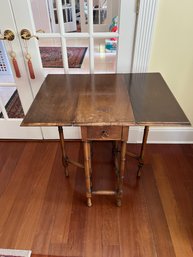 44. Drop Leaf Table With One Drawer