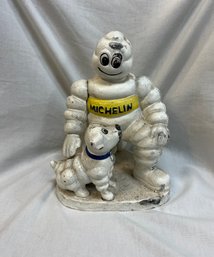16. Cast Iron Michelin Man With Dog