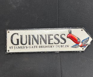 7. Cast Iron Guiness Beer Sign