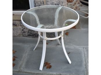 18. Glass Topped Outdoor Table