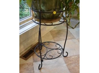 8. Wrought Iron Plant Stand