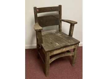 33. Heavy Wooden Arm Chair