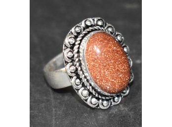 34. German Silver Ring: Red Sun Stone