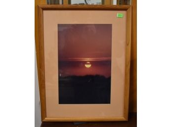 117. Framed Colored Photo Of A Sunset