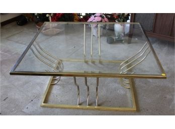 84. Glass And Brass Coffee Table