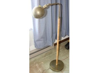 114. Brass And Whicker Covered Floor Lamp