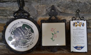 Assortment Of Cast Iron And Ceramic Trivets - Tavern Rules, Adirondacks & Floral