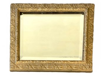 A Small Vintage Beveled Mirror