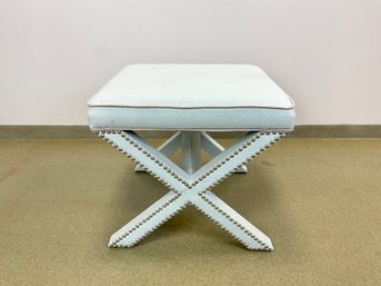 An Upholstered Palmer Ottoman By Safavieh