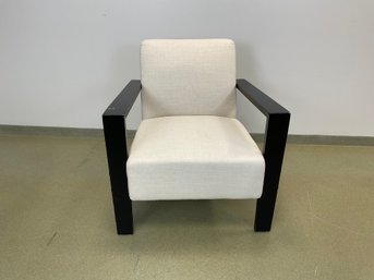 An Upholstered Jenna Arm Chair By Safavieh