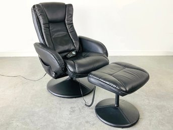 An Electric Black Massage Recliner With Foot Rest