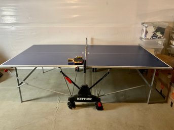 An Outdoor ALU-TEC Ping Pong Table By Kettler