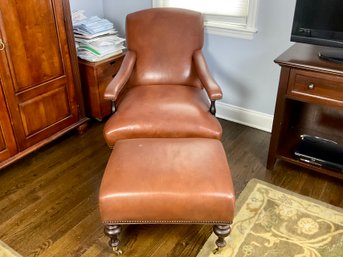 Leather Upholstered Armchair And Ottoman