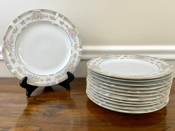Twelve Excel Fine China Dinner Plates