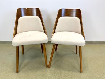 A Pair Of Mid Century Style Dining Chairs By Lumisource