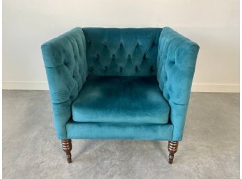 A Button Tufted Accent Chair