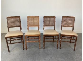 A Set Of Four Bamboo Folding Chairs By Stakmore Co.