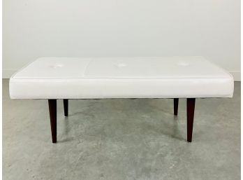 A White Faux Leather Bench
