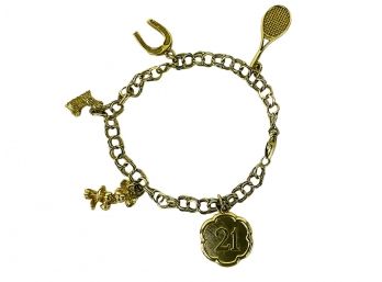 A 14K Gold Charm Bracelet With 5 Charms