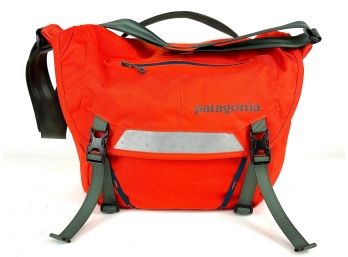 A Patagonia Orange MiniMass Messenger Bag