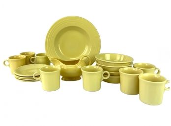 A Collection Of Yellow Fiesta Tableware, 18 Pieces