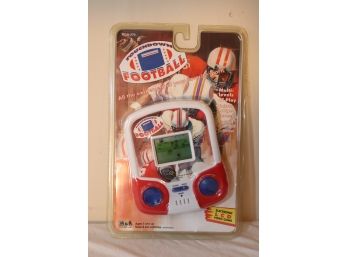 NEW IN PACKAGE 1995 MGA MICRO GAMES OF AMERICA HAND HELD TOUCHDOWN FOOTBALL ELECTRONIC GAME