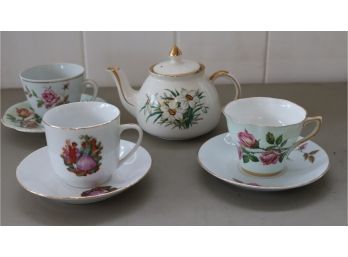 Tea Pot And 3 Cups And Saucers