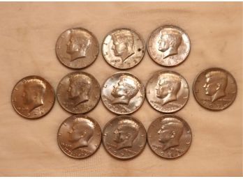 11 Kennedy Half Dollar Coins