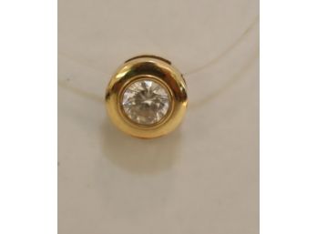 Floating 14k Gold And Diamond Pendant On Clear Fishing Line