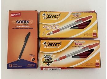 12 Staples Sonix Black Gel And 23 Bic Round Stick Grip Red Ink Pens