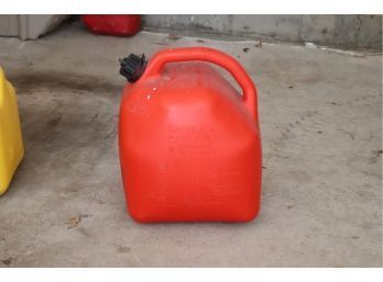 Red 5 Gallon Gas Can With Fuel In It
