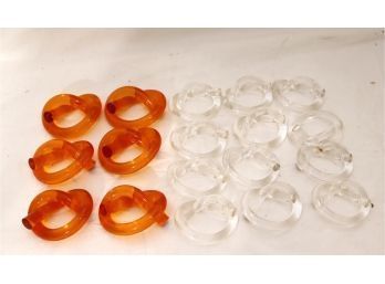 VINTAGE SET OF 6 AMBER AND 12 CLEAR ACRYLIC NAPKIN RINGS
