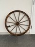 A Pair Of Large Display Wagon Wheels-Wood Stained