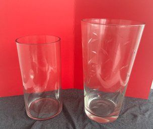 A Pair Of Tall Clear Glass Vases