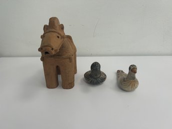A Trio Of Mexican Figurines