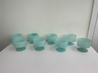 A Set Of Vintage Sea Glass Colored Dessert Dishes