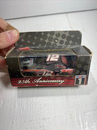 New In Box Mobil 1 25th Anniversary Team Jeremy Mayfield Diecast Car #12