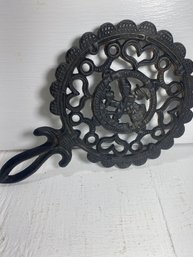Cast Iron Trivet With Hearts And Little Boy Pattern