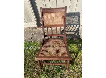 Antique Caned Rush Arm Rocking Chair