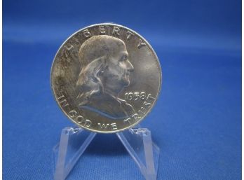 1958 D Denver Franklin Silver Half Dollar UNC