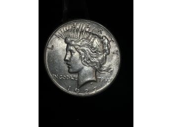 1927 Peace Silver Dollar - Almost Uncirculated