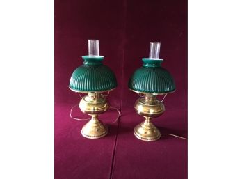 A Pair Of Vintage Brass Lamps With Glass Shades