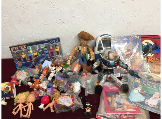 1980's Toy Assortment Including Happy Meal Toys- Strawberry Short Cake, Toy Story, Books On Tape,