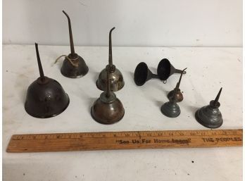 Vintage Oil Cans And Metal Funnels