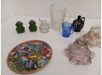 Vintage Glass Assortment Including Shirley Temple Creamer, Lamp Shades, Frog Jars, And More