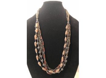 Multi Strand Iridescent Beaded Necklace With Wooden Accent Beads And Two Beaded Bracelets (3 Pcs)