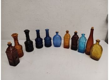 Vintage Assortment Of Colored Glass Decanters