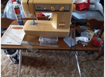 Vintage Brother Sewing Machine, Sewing Assortment, And Table