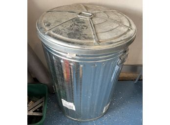 Metal Trash Can Filled With Potting Soil
