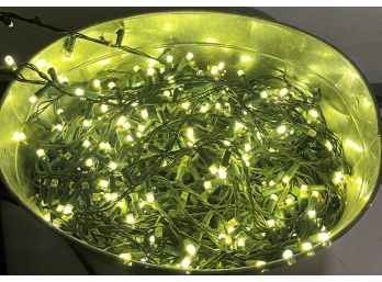 Large Metal Basket Filled With White Christmas Lights